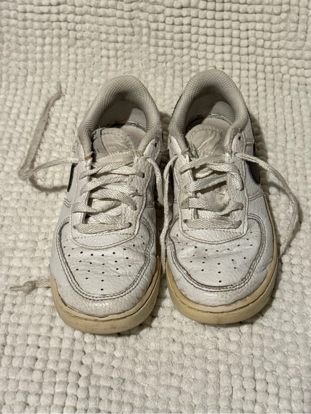 Nike Kids White Sneakers with Black Swoosh